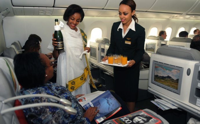 Flight attendants serve