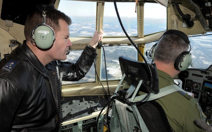 Two men in the cockpit of an