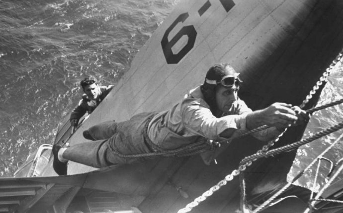 Navy pilot being rescued from